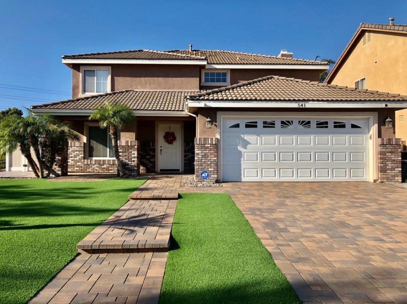 Front yard paver walkway and turf