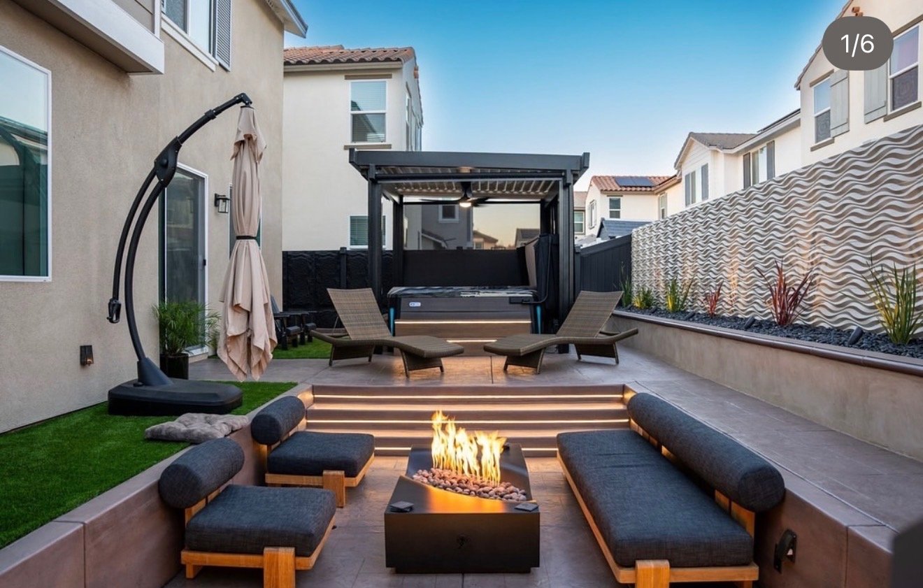 Luxury backyard pergola fire pit spa